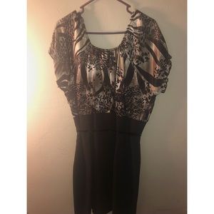 Cute black dress with animal print top Size 24